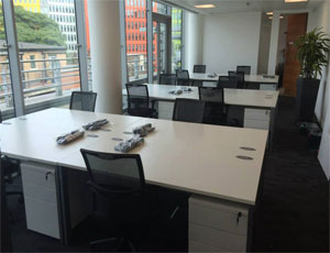 small london office fit out with desks and chairs.