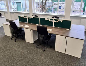 complete office fitout with desks, monitor arms and chairs all installed by our team.